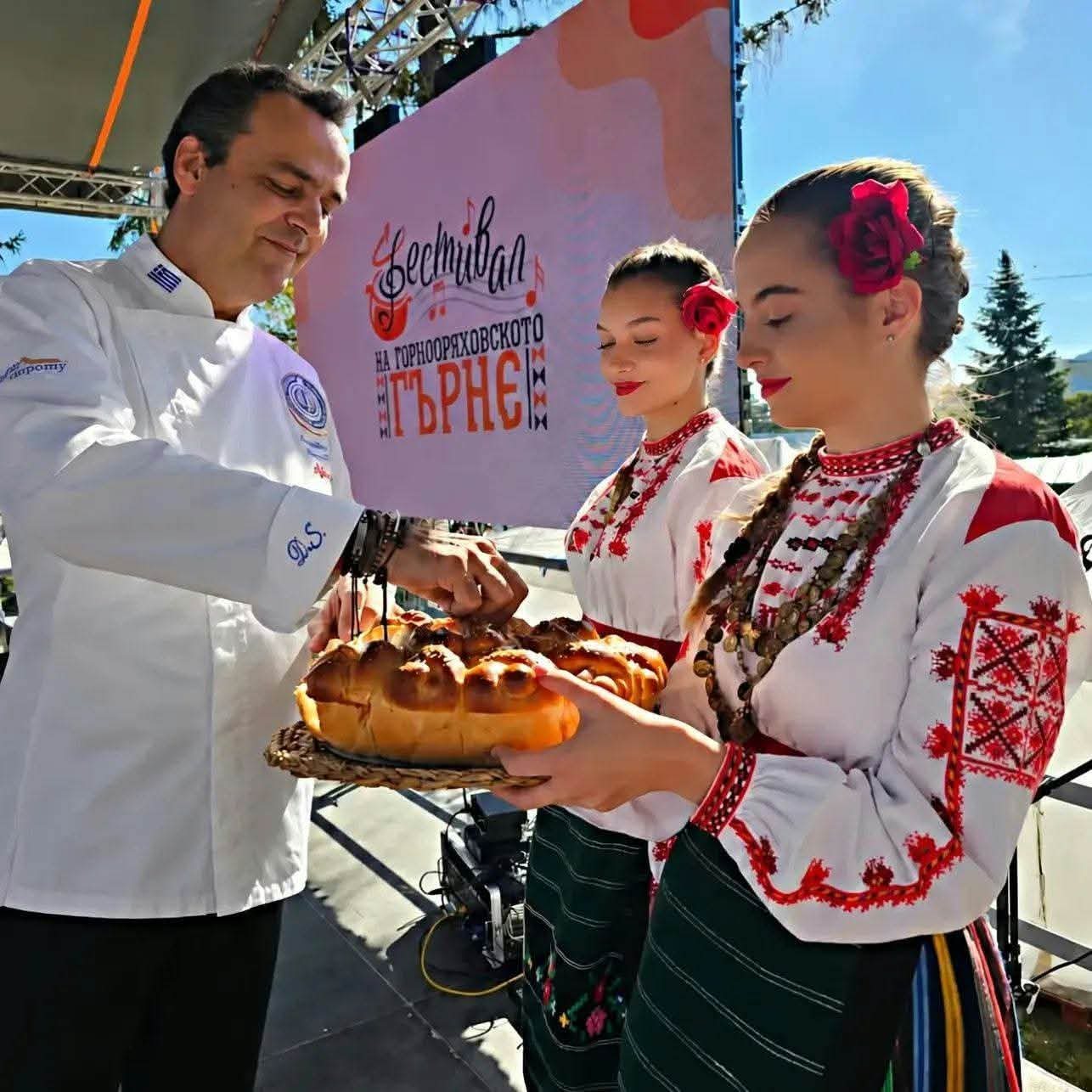 Stylianos Digkas receiving the traditional Bulgarian welcome bread at the Gorna Oryahovitsa Pot Festival